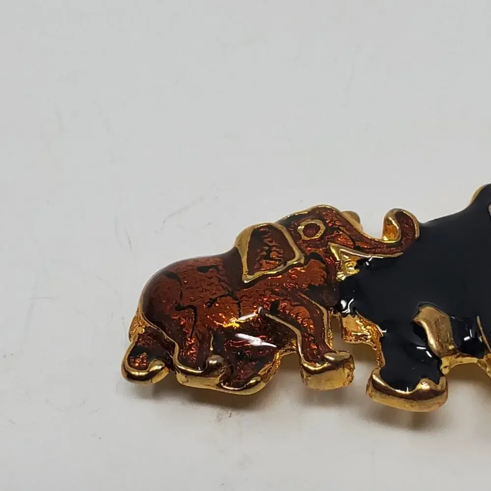 Vintage Gold tone & Enamel walking elephant brooch Great condition